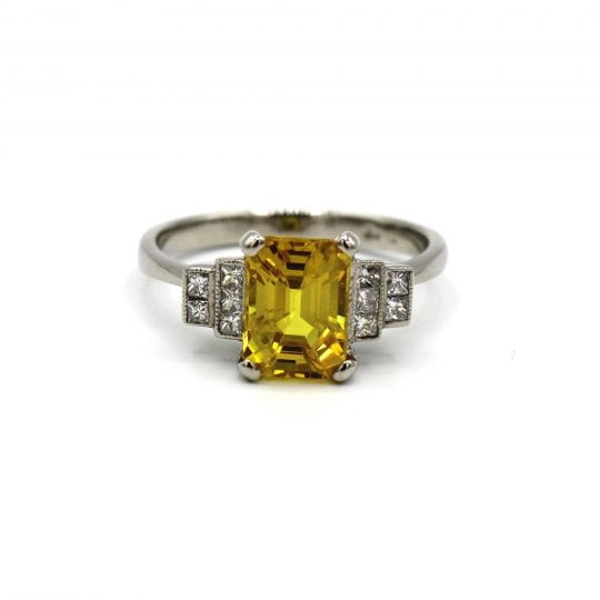 Vintage Yellow Sapphire Engagement Ring With Stepped Shoulders