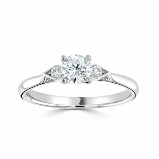 Delicate Four Claw Round Solitaire Engagement Ring